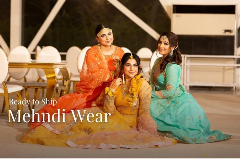 Ready to ship mehndi wear by Maira Khan: three women in orange, mustard and turquoise