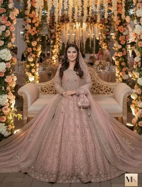 A Maira Khan bride in a blush pink bridal lehenga